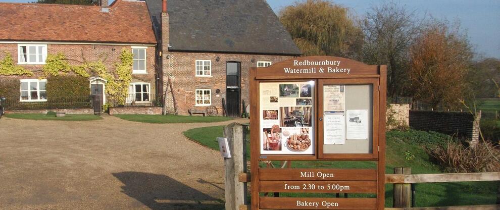 Redbournbury Mill and information board viewed from Redbournbury Lane