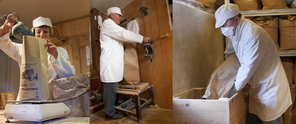 Volunteers at Redbournbury Mill bagging, milling and screening flour