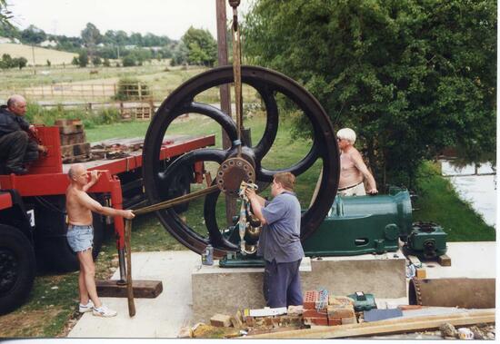 Lifitng the flywheel onto the bed